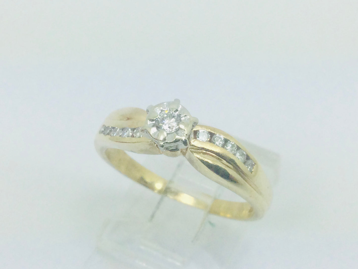 10k Yellow Gold Round Cut 0.16ct Diamond Illusion and Channel Set Ring