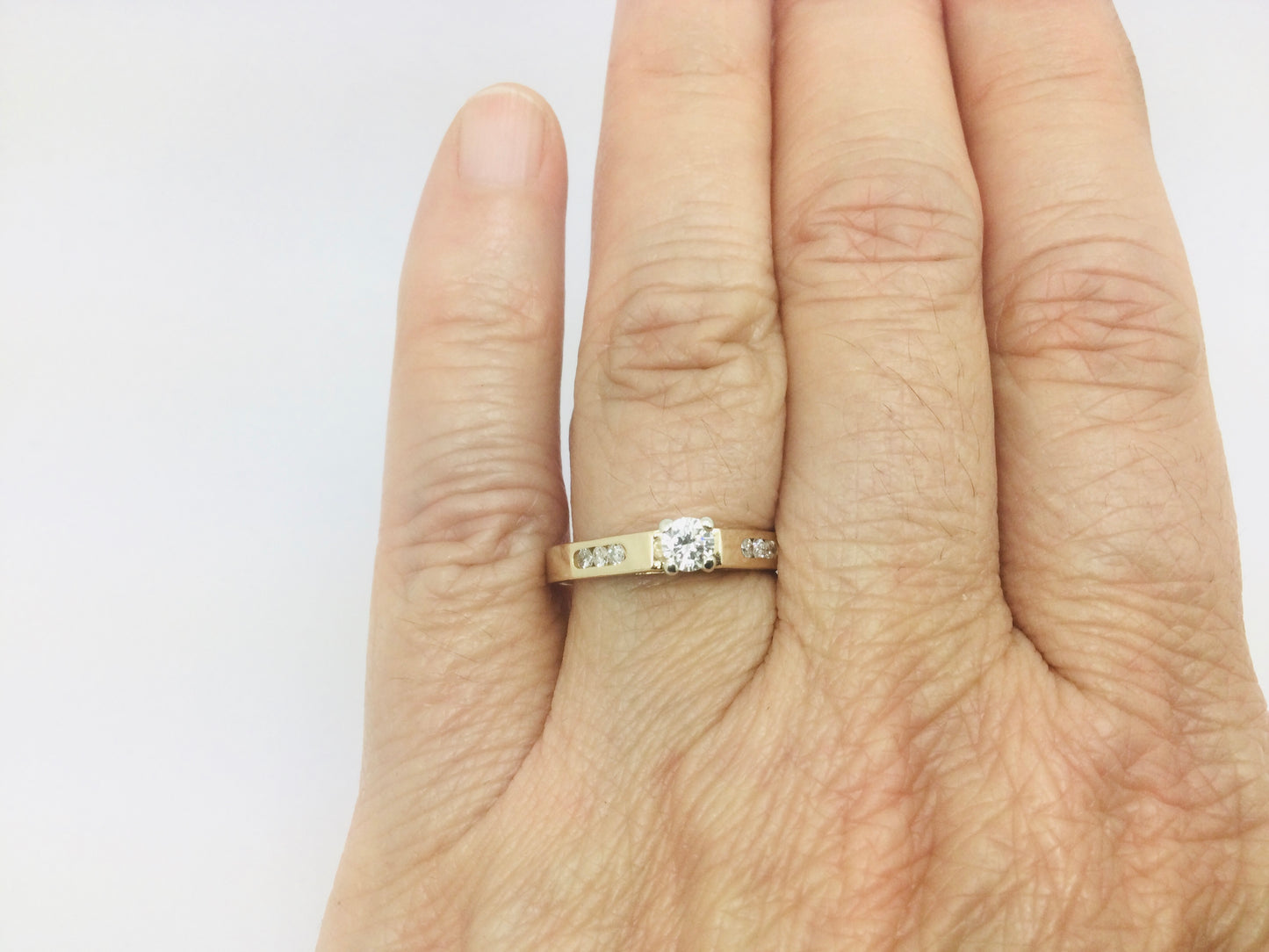 14k Yellow Gold Round Cut 29pt Diamond with Channel Set Accent Ring