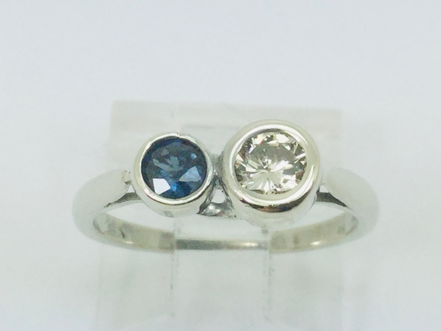 14k White Gold Round Cut 25pt Diamond & 16pt Sapphire Ring