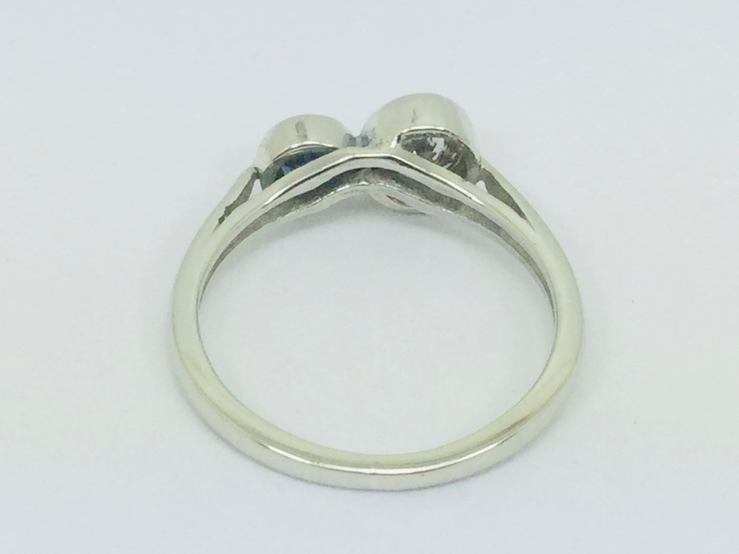 14k White Gold Round Cut 25pt Diamond & 16pt Sapphire Ring