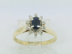 10k Yellow and White Gold Oval Cut 25pt Sapphire September Birthstone & 10pt Diamond Halo Ring