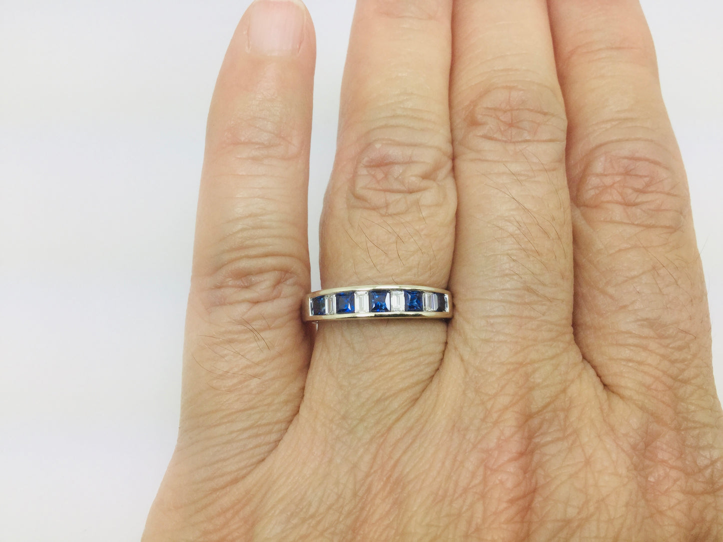 18k White Gold Princess Cut 50pt Sapphire & Baguette Cut 32pt Diamond Ring