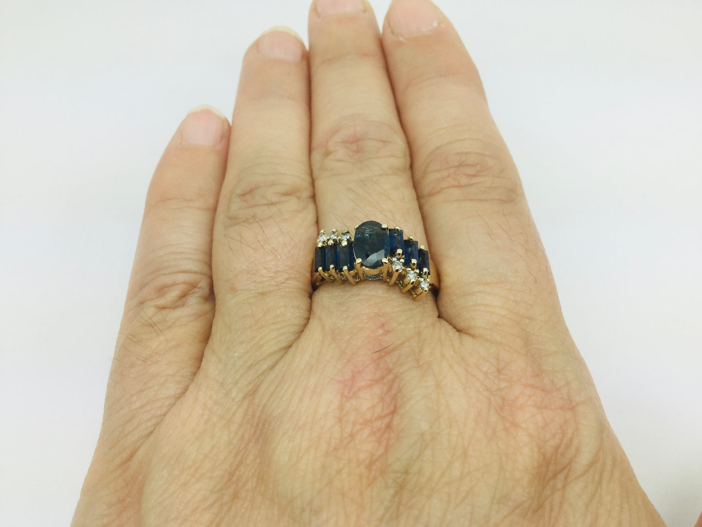 14k Yellow Gold Oval Cut and Baguette Cut 48pt Sapphire & 9pt Diamond Ring