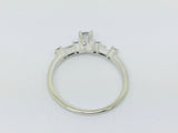 14k White Gold Round Cut 23pt Diamond with Round and Baguette Diamond Accents Ring