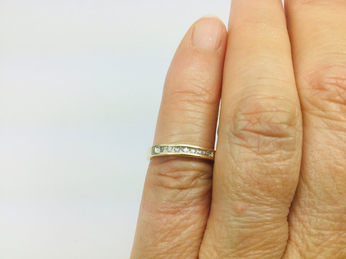 10k Yellow Gold Round Cut 7pt Diamond Channel Set Ring