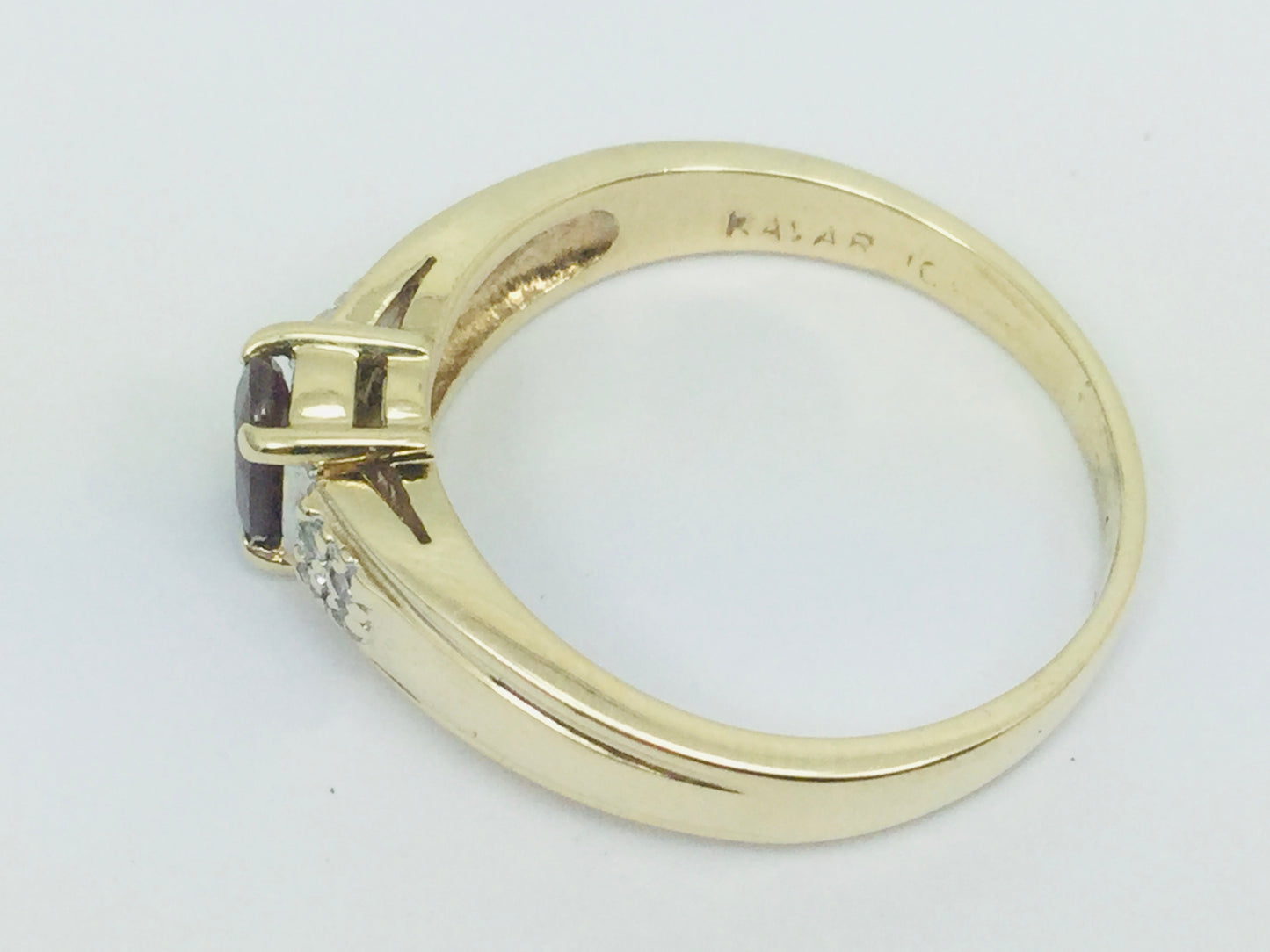 10k Yellow Gold Round Cut 50pt Ruby July Birthstone & 8pt Diamond Accent Ring