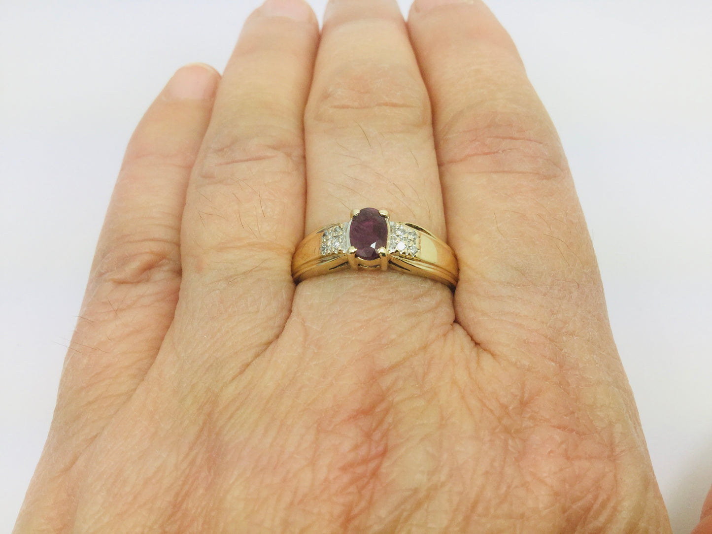 10k Yellow Gold Round Cut 50pt Ruby July Birthstone & 8pt Diamond Accent Ring
