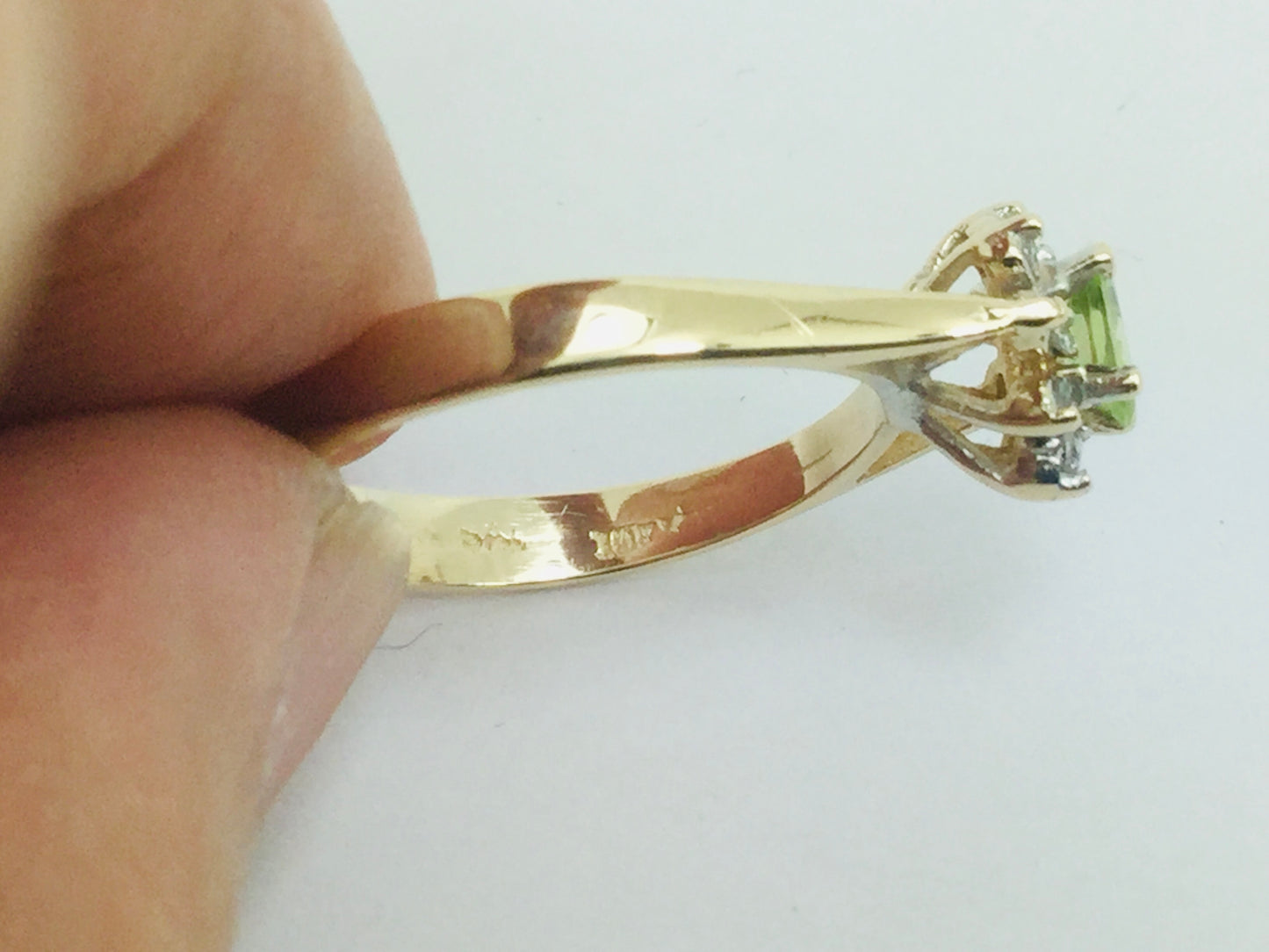 10k Yellow Gold Oval Cut 25pt Peridot August Birthstone & 8pt Diamond Halo Ring