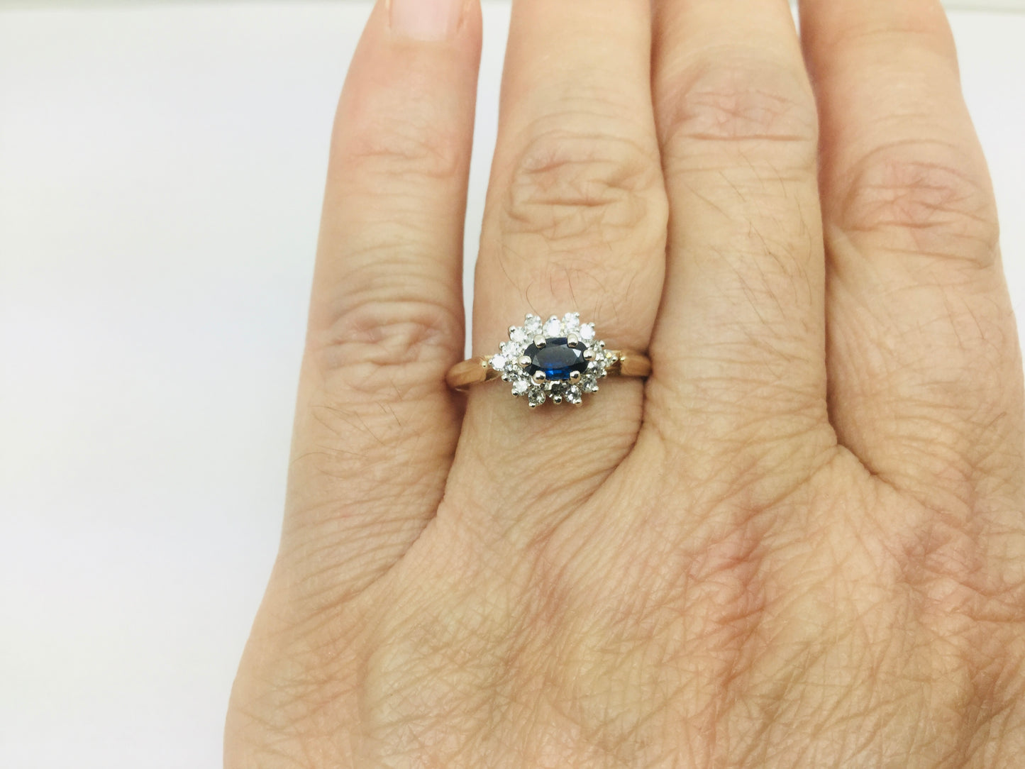 14k Yellow and White Gold Oval Cut 0.35ct Sapphire September Birthstone & 0.30ct Diamond Cluster Ring