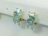 14k Yellow Gold Emerald Cut Blue Topaz Clip-On Earrings