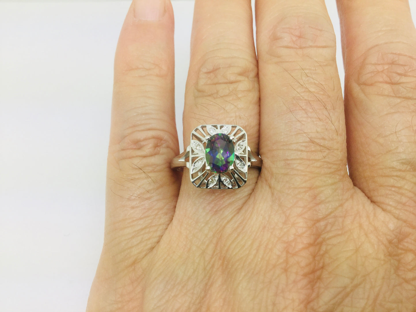 10k White Gold Oval Cut 0.75ct Rainbow Topaz & Diamond Accent Ring