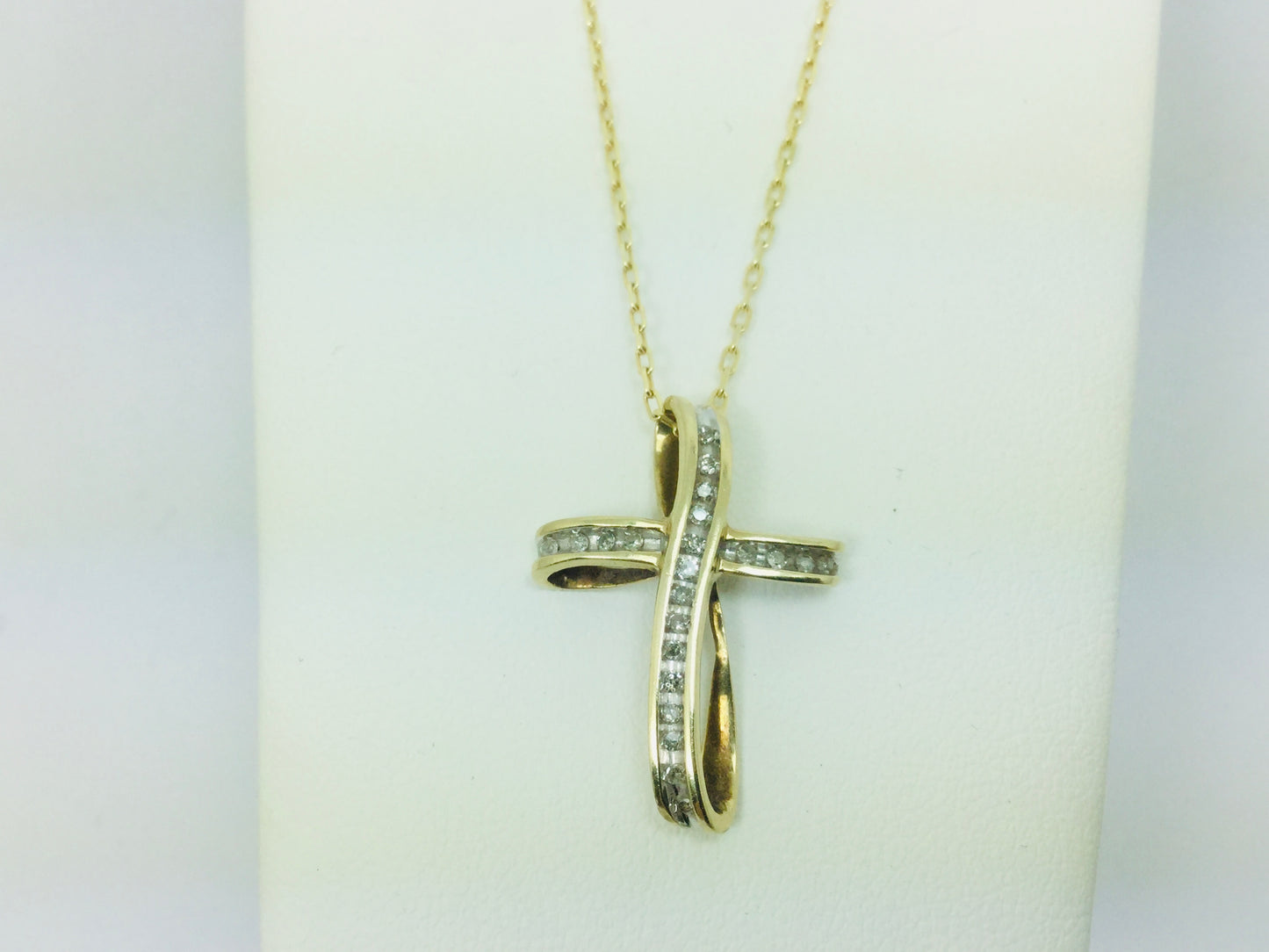 10k Yellow Gold Round Cut 11pt Diamond Cross Pendent