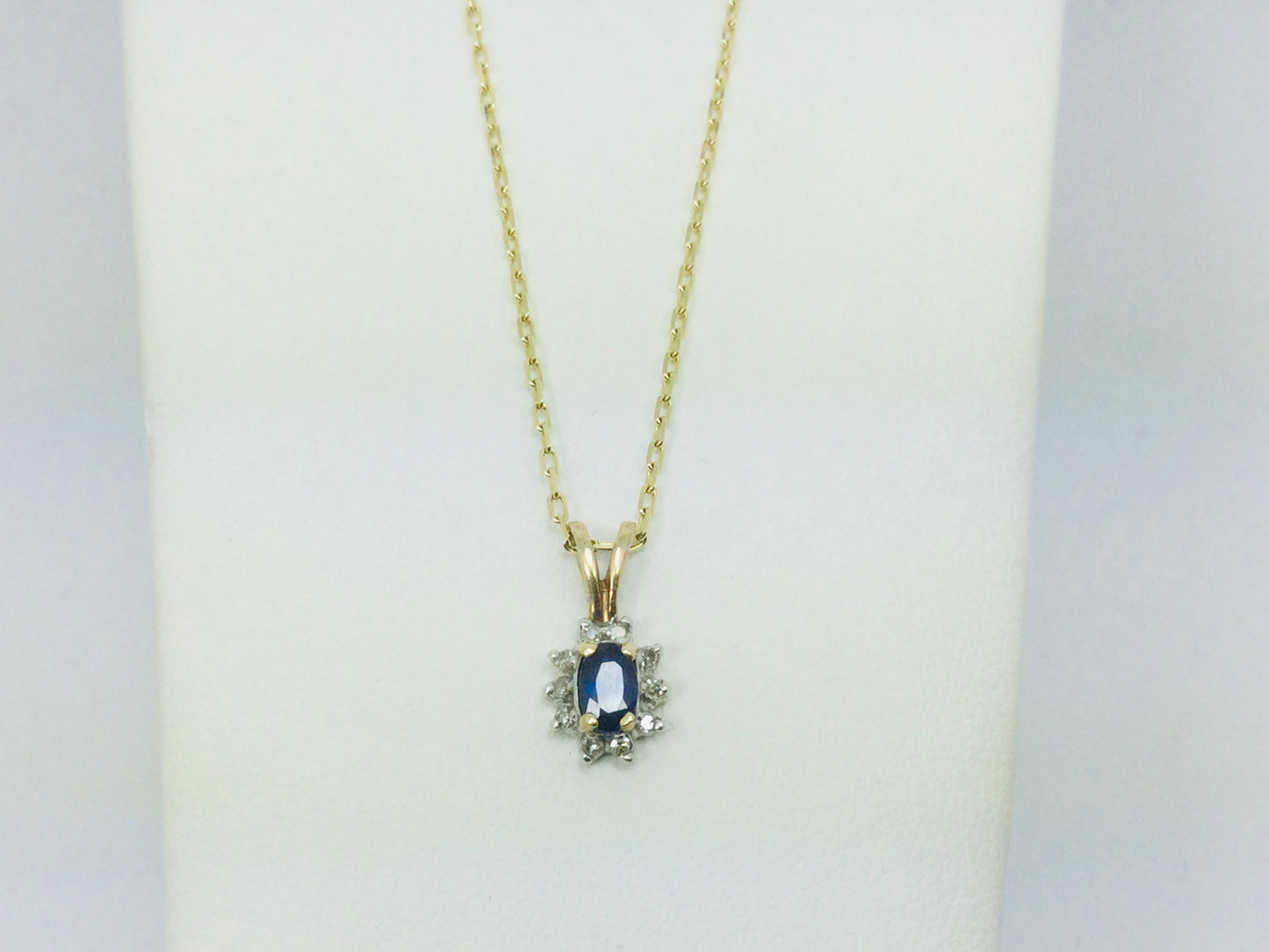 10k Yellow Gold Oval Cut 25pt Sapphire & 10pt Diamond Halo Pendent