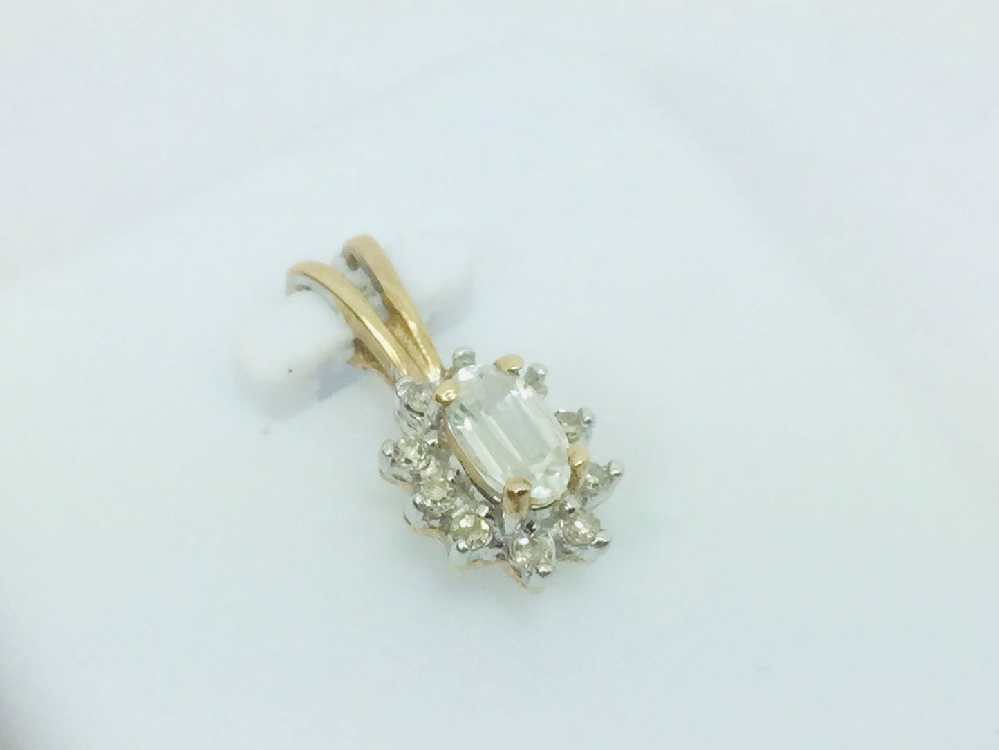 10k Yellow Gold Oval Cut 25pt Topaz & 10pt Diamond Halo Pendent
