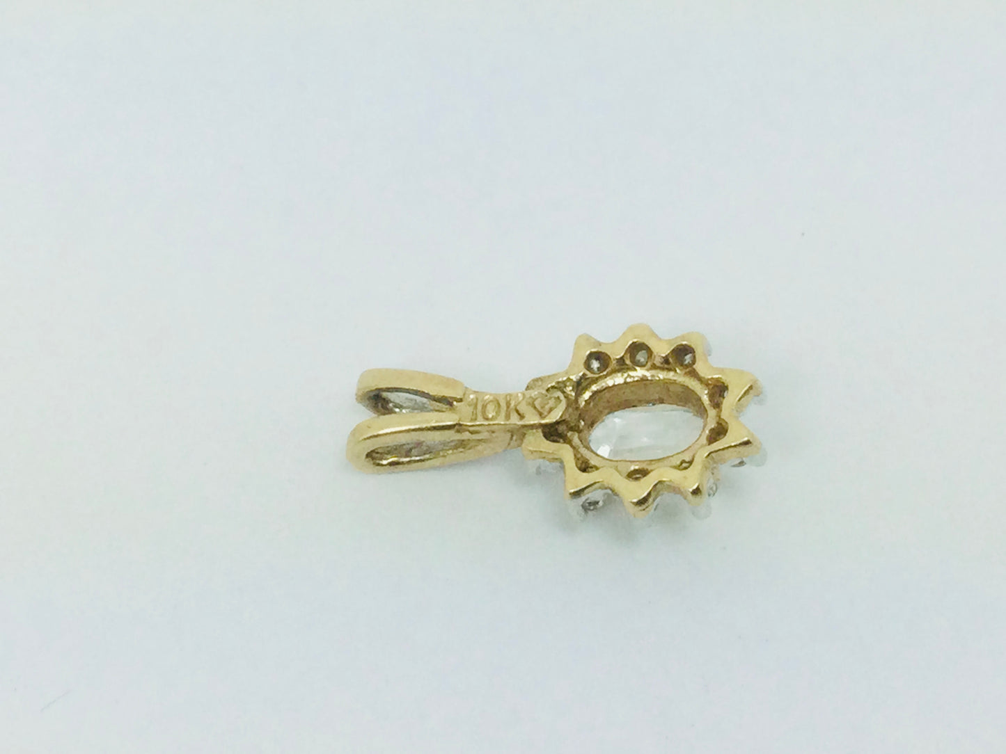 10k Yellow Gold Oval Cut 25pt Topaz & 10pt Diamond Halo Pendent