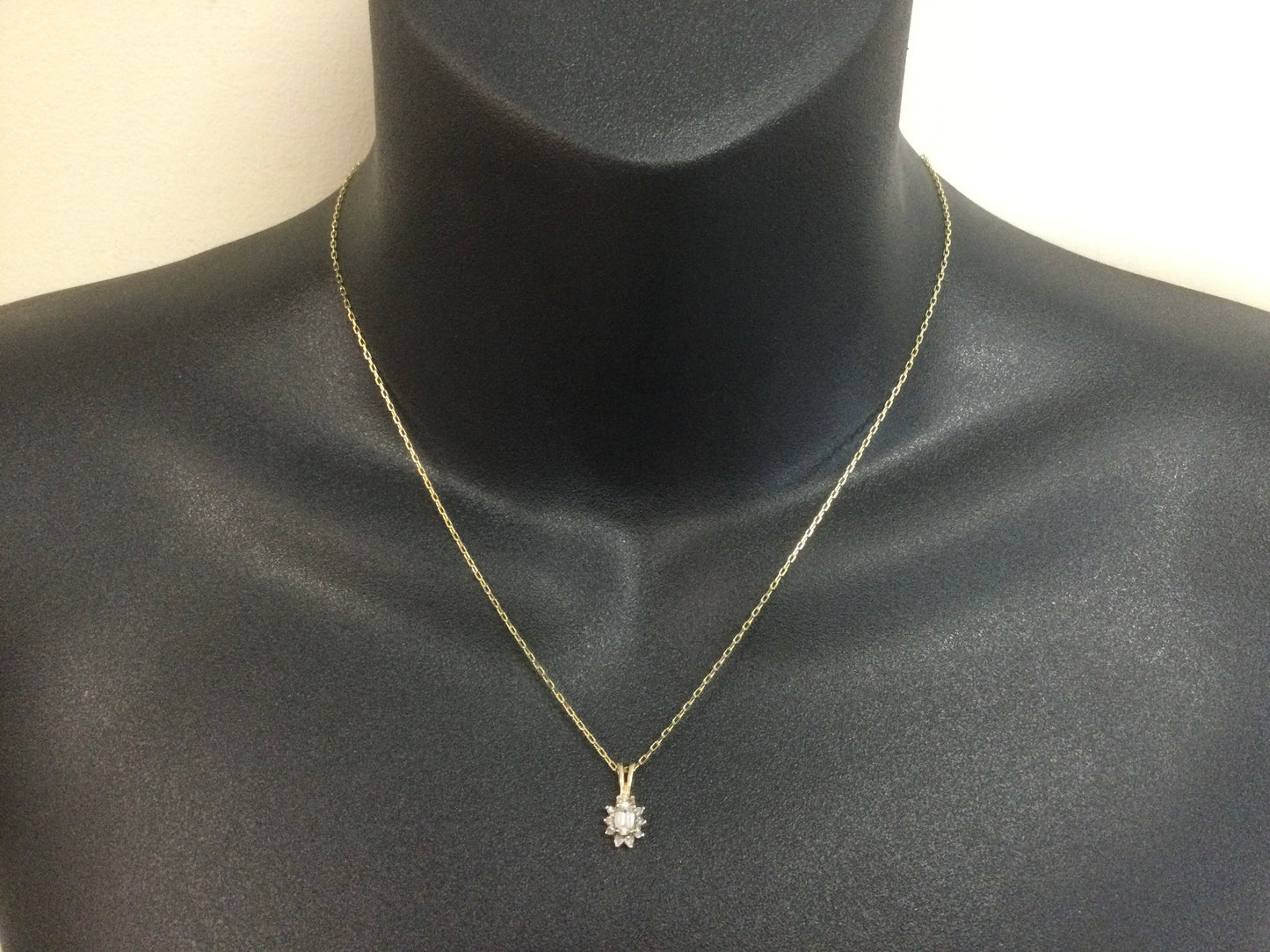 10k Yellow Gold Oval Cut 25pt Topaz & 10pt Diamond Halo Pendent