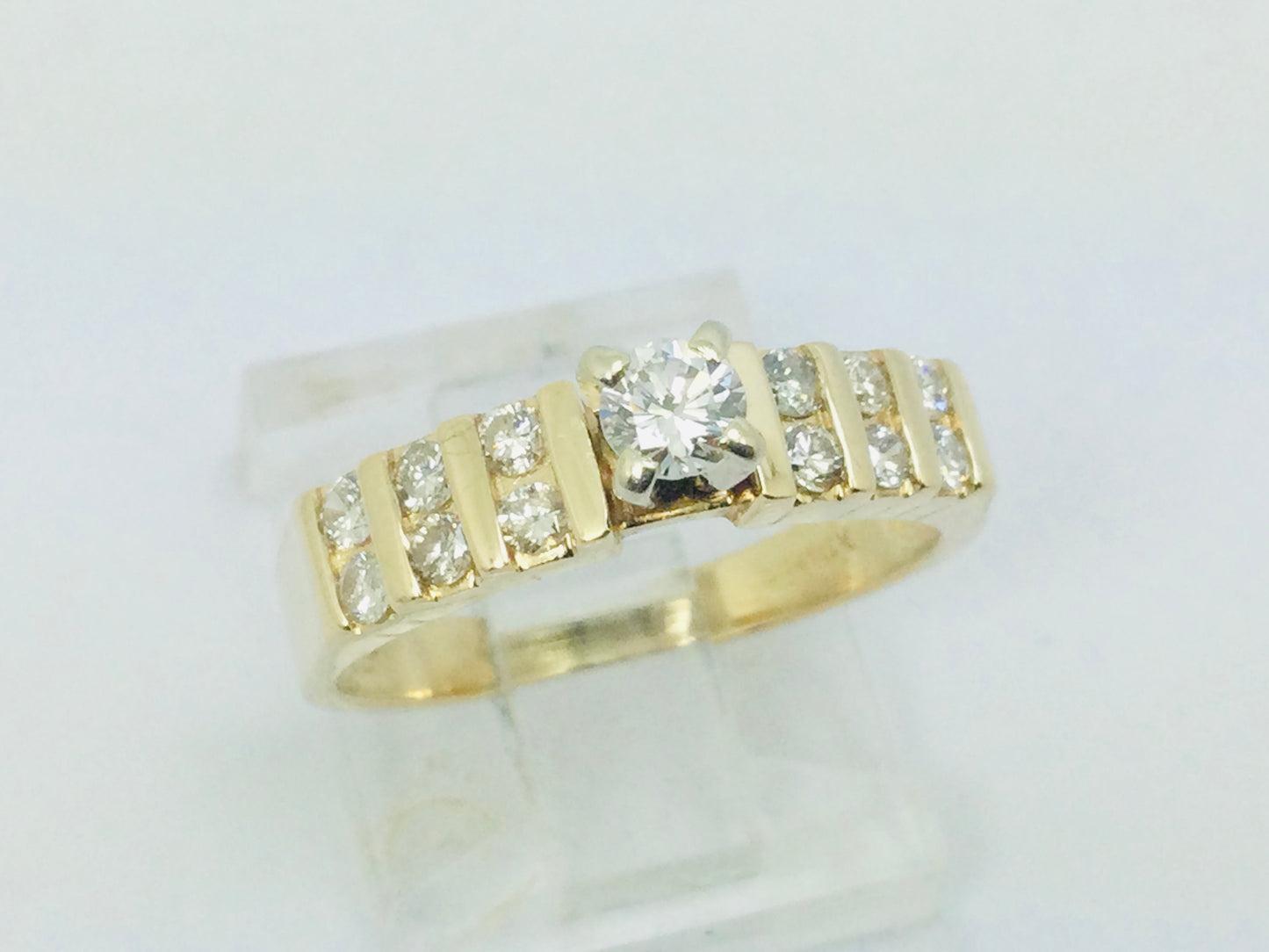 14k Yellow Gold 45pt Round Cut Diamond with Channel Set Accents Ring