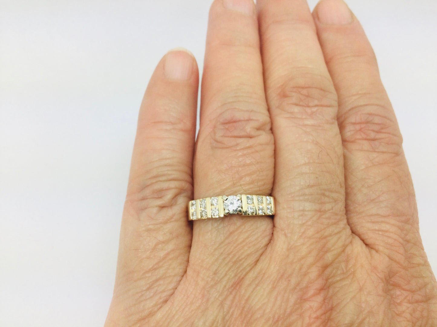 14k Yellow Gold 45pt Round Cut Diamond with Channel Set Accents Ring