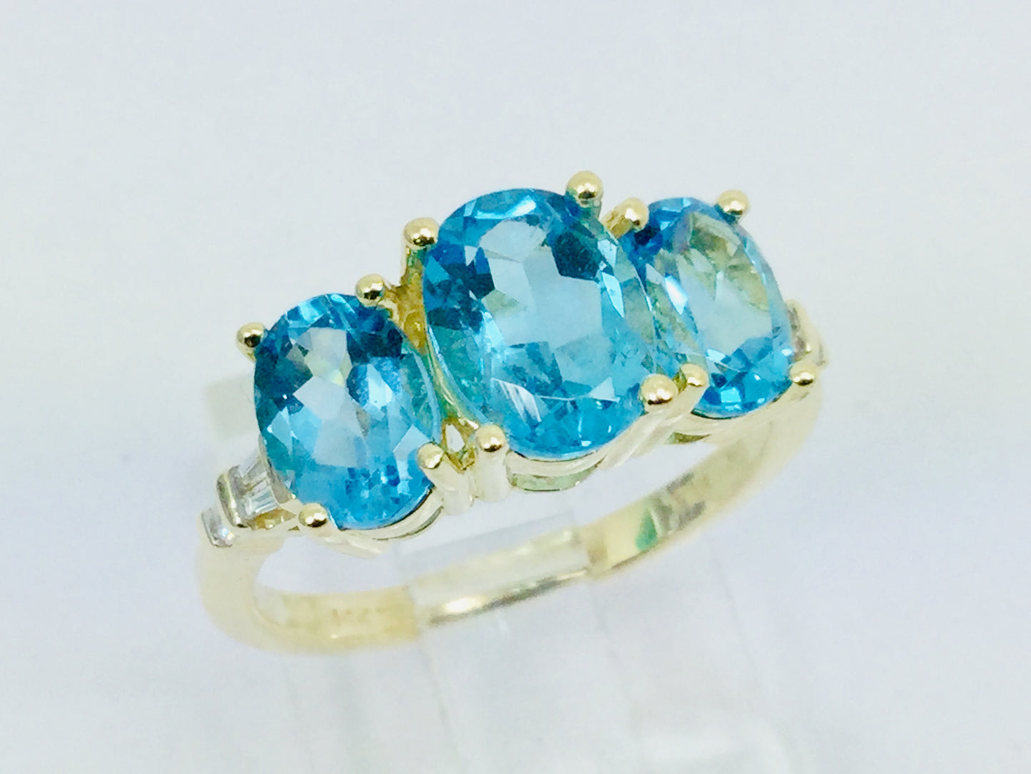 14k Yellow Gold Oval Cut Blue Topaz December Birthstone & Diamond Ring