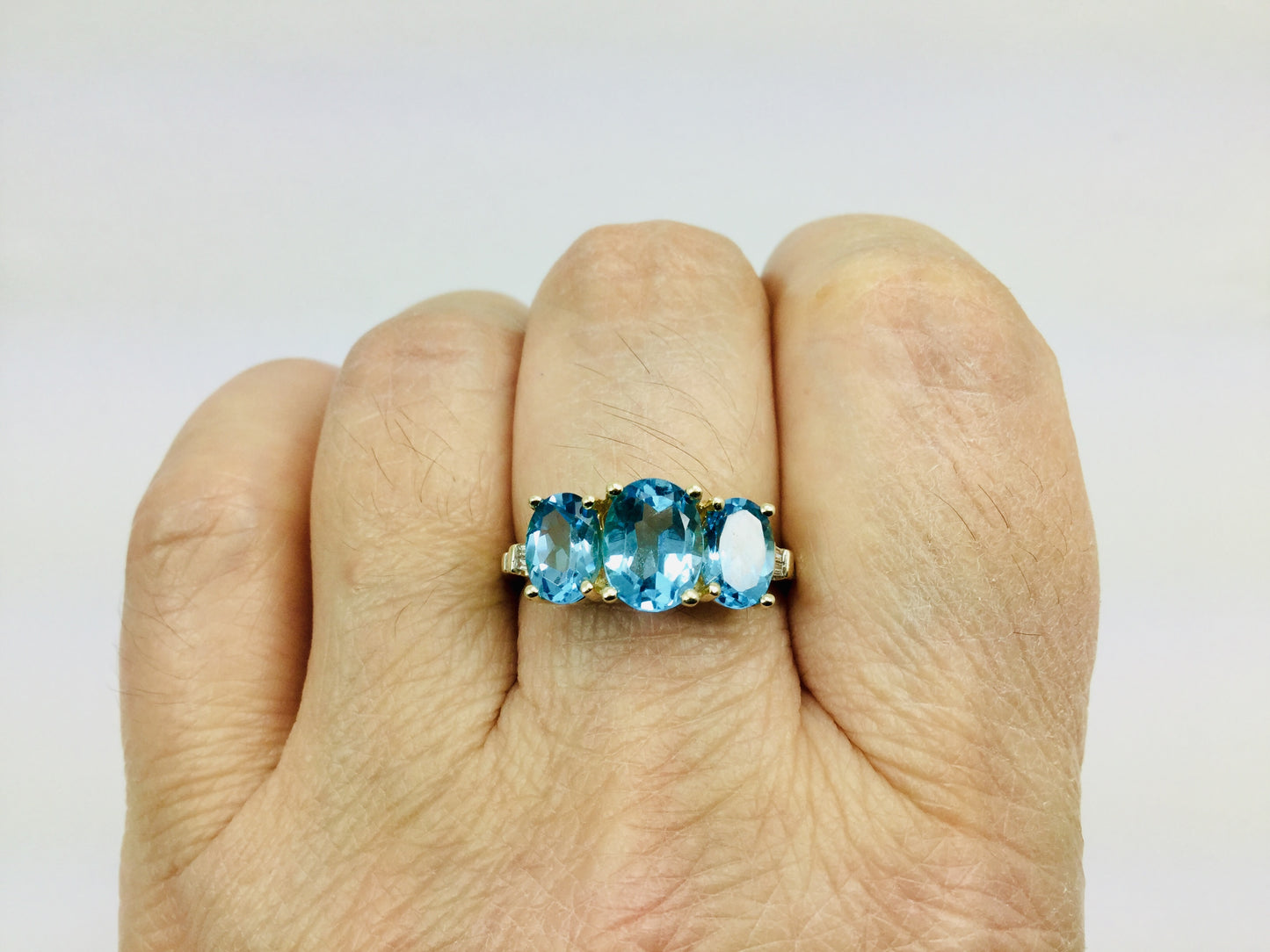 14k Yellow Gold Oval Cut Blue Topaz December Birthstone & Diamond Ring