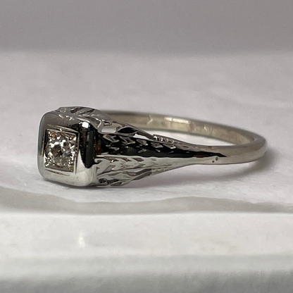 10k White Gold Round Cut 0.08ct Diamond Solitaire Ring