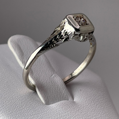 10k White Gold Round Cut 0.08ct Diamond Solitaire Ring