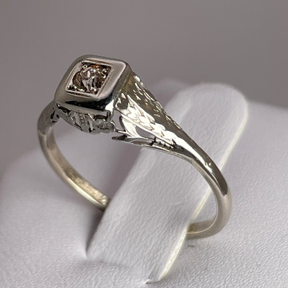 10k White Gold Round Cut 0.08ct Diamond Solitaire Ring