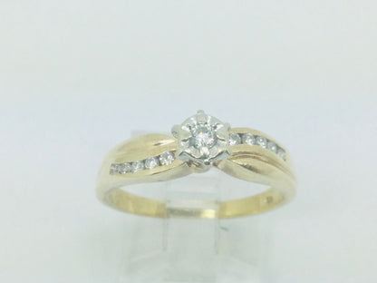 10k Yellow Gold Round Cut 0.16ct Diamond Illusion and Channel Set Ring