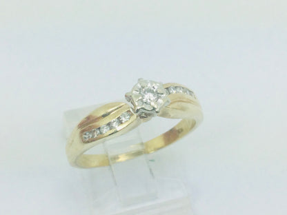 10k Yellow Gold Round Cut 0.16ct Diamond Illusion and Channel Set Ring