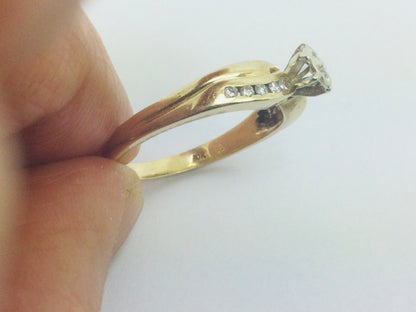 10k Yellow Gold Round Cut 0.16ct Diamond Illusion and Channel Set Ring