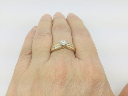 10k Yellow Gold Round Cut 0.16ct Diamond Illusion and Channel Set Ring