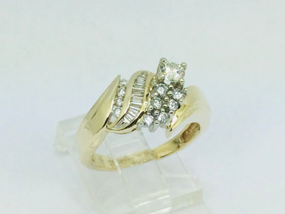 14k Yellow Gold Round and Baguette Cut 0.70ct Diamond Cluster Ring