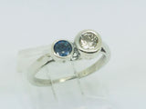 14k White Gold Round Cut 25pt Diamond & 16pt Sapphire Ring