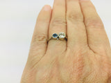 14k White Gold Round Cut 25pt Diamond & 16pt Sapphire Ring