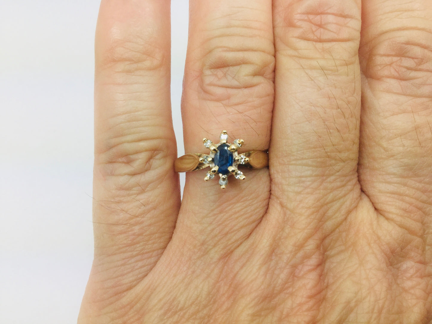 10k Yellow Gold Oval Cut 25pt Sapphire September Birthstone & 8pt Diamond Halo Ring