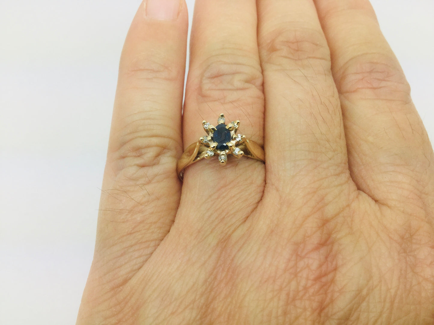 10k Yellow Gold Oval Cut 25pt Sapphire September Birthstone & 8pt Diamond Halo Ring