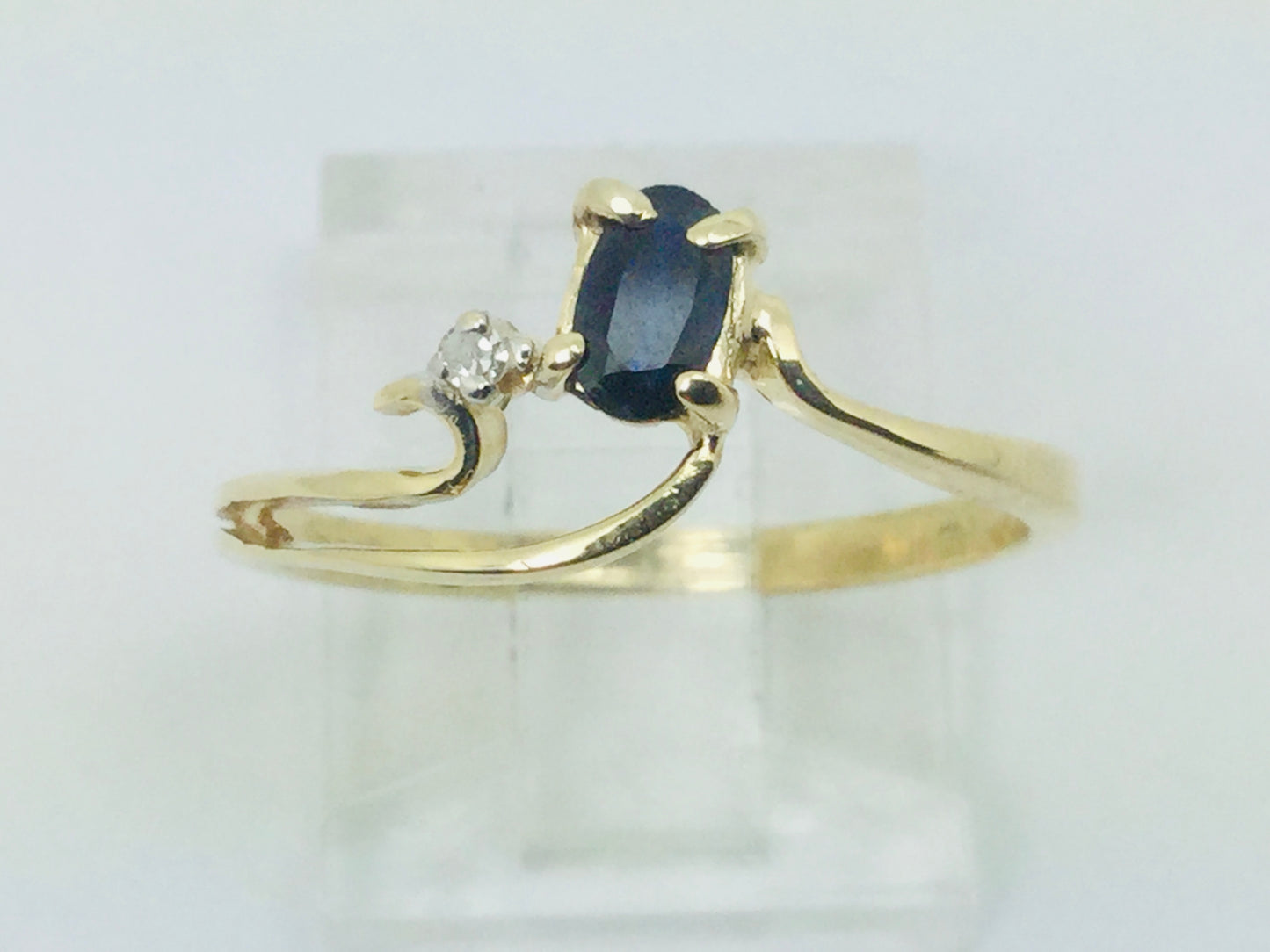 10k Yellow Gold Oval Cut 25pt Sapphire September Birthstone & 2pt Diamond Wave Ring