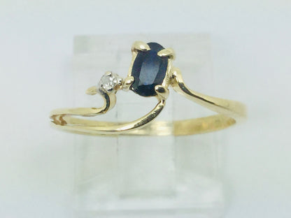 10k Yellow Gold Oval Cut 25pt Sapphire September Birthstone & 2pt Diamond Wave Ring