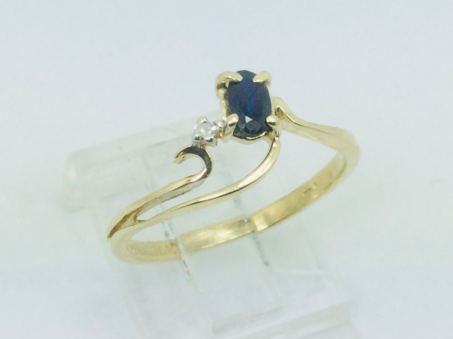 10k Yellow Gold Oval Cut 25pt Sapphire September Birthstone & 2pt Diamond Wave Ring