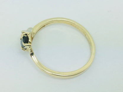 10k Yellow Gold Oval Cut 25pt Sapphire September Birthstone & 2pt Diamond Wave Ring