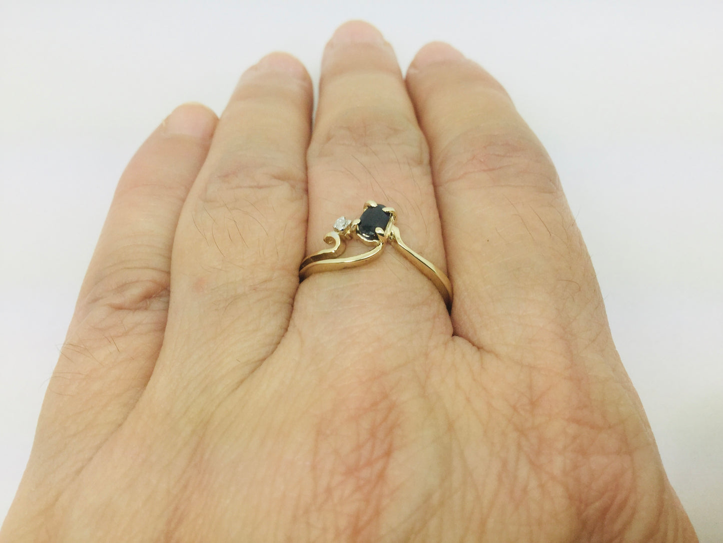 10k Yellow Gold Oval Cut 25pt Sapphire September Birthstone & 2pt Diamond Wave Ring