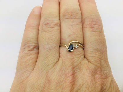 10k Yellow Gold Oval Cut 25pt Sapphire September Birthstone & 2pt Diamond Wave Ring