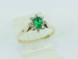 10k Yellow Gold Oval Cut 25pt Emerald May Birthstone & 8pt Diamond Cluster Ring