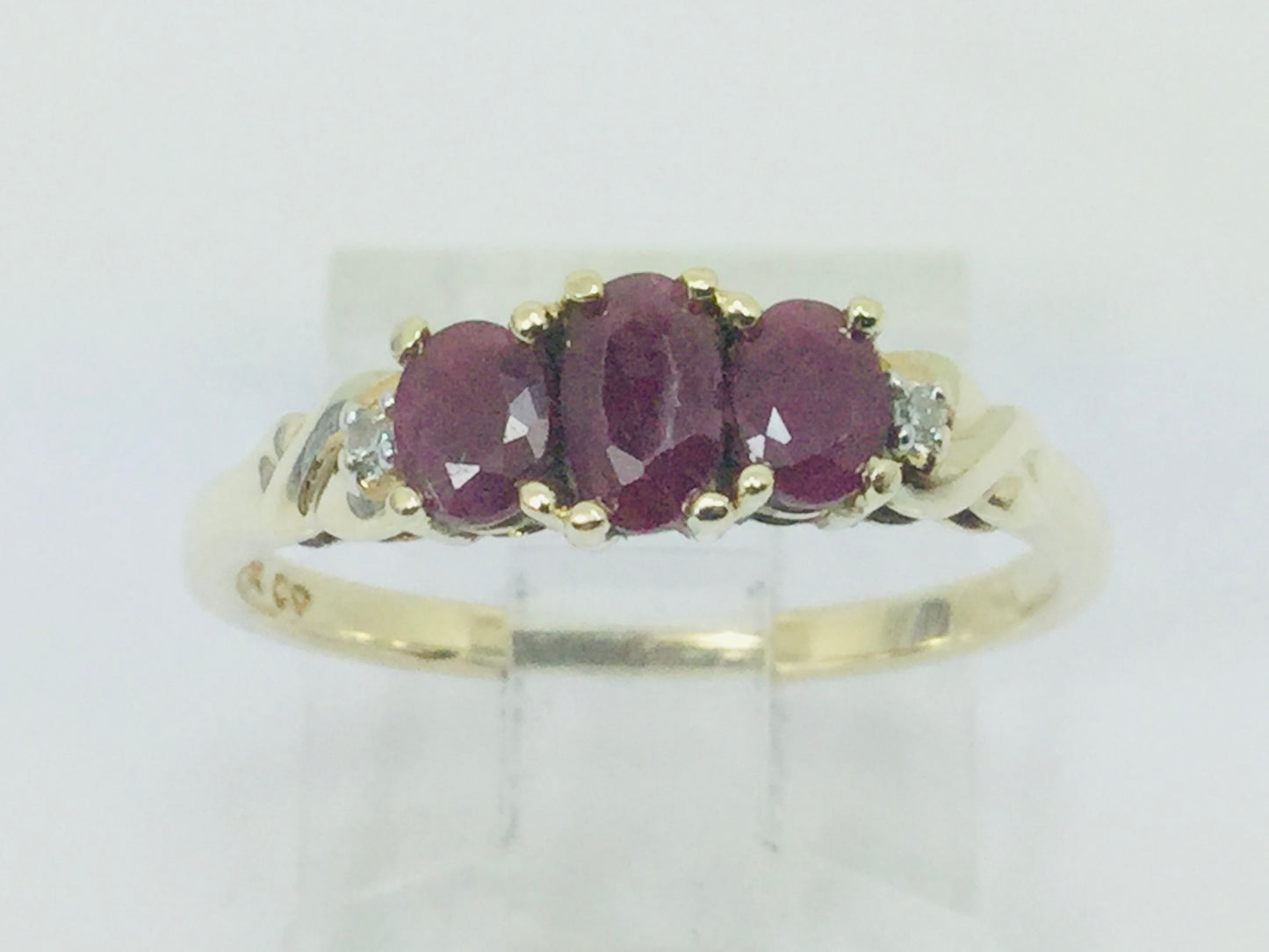 10k Yellow Gold Oval Cut Ruby July Birthstone Trinity & Diamond Ring
