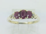 10k Yellow Gold Oval Cut Ruby July Birthstone Trinity & Diamond Ring