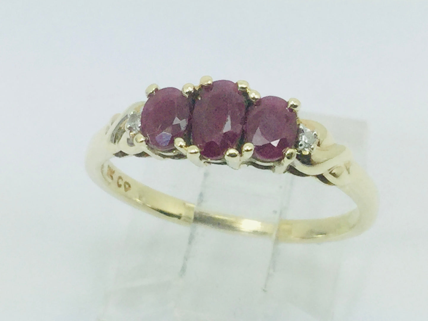 10k Yellow Gold Oval Cut Ruby July Birthstone Trinity & Diamond Ring