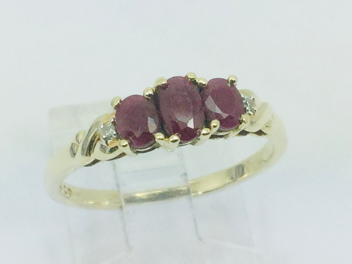 10k Yellow Gold Oval Cut Ruby July Birthstone Trinity & Diamond Ring