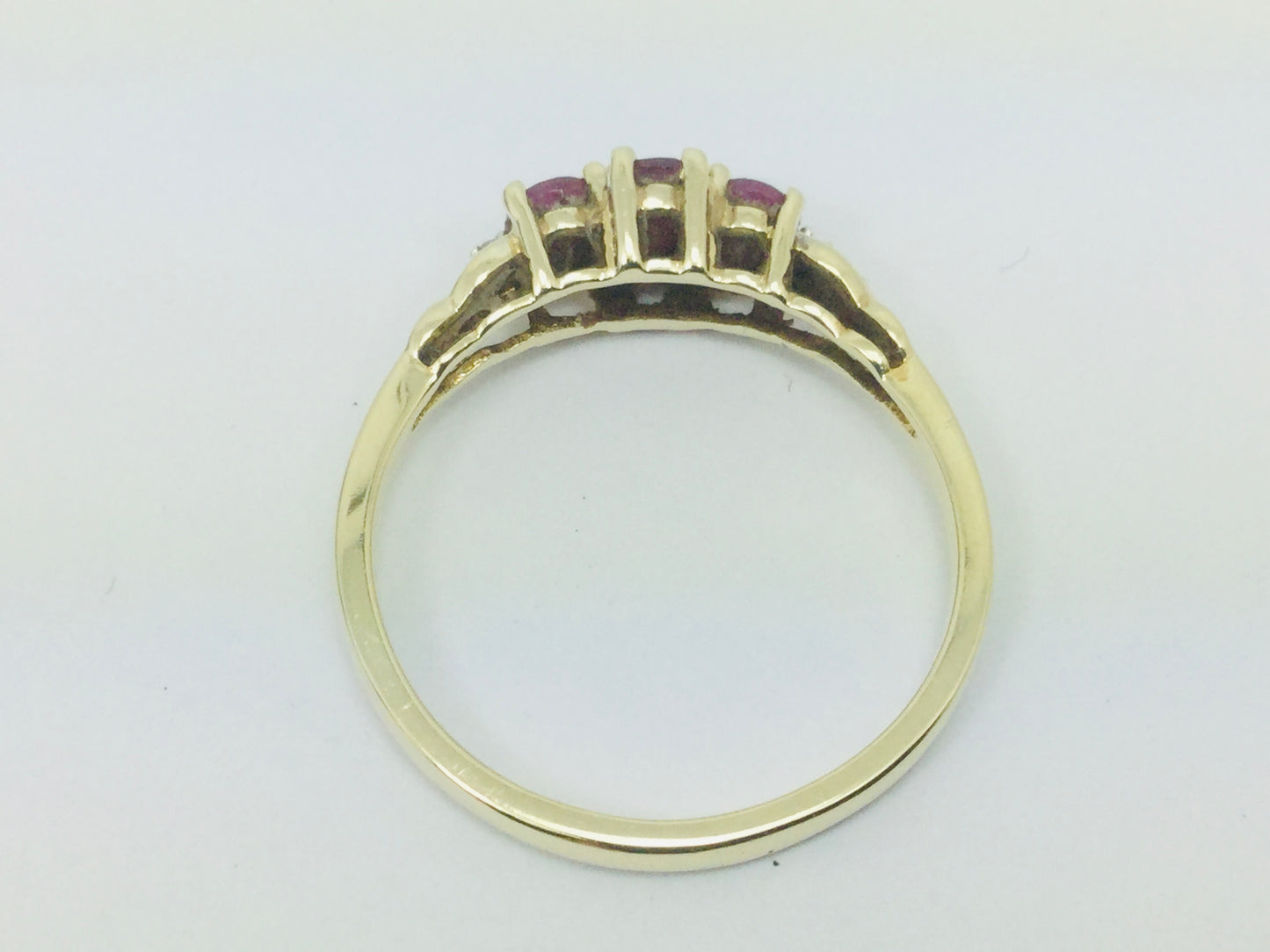 10k Yellow Gold Oval Cut Ruby July Birthstone Trinity & Diamond Ring