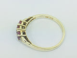10k Yellow Gold Oval Cut Ruby July Birthstone Trinity & Diamond Ring