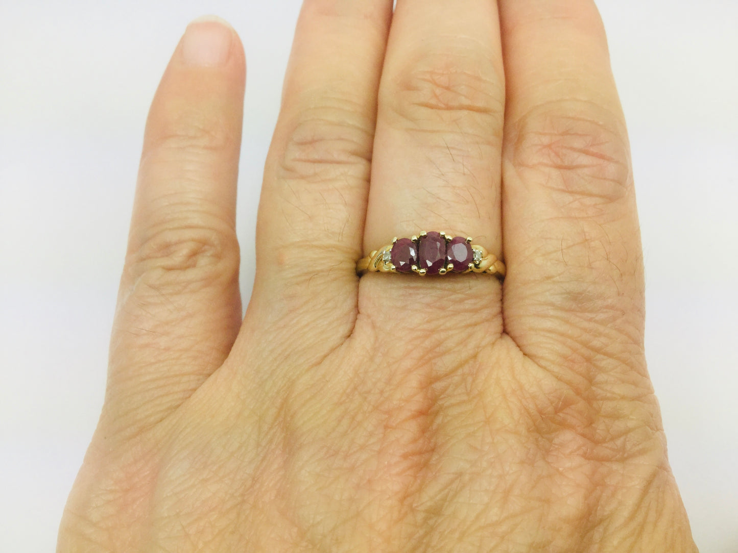 10k Yellow Gold Oval Cut Ruby July Birthstone Trinity & Diamond Ring